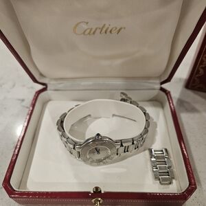 Cartier Silver Watch with Blue Crown